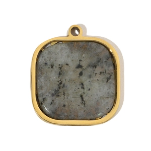 Macro view of square rounded gold stainless steel pendant with gray natural stone inlay