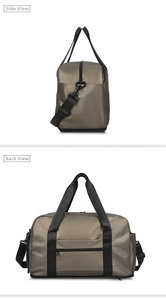 Detail view of the travel bag featuring a luggage trolley strap and waterproof nylon fabric