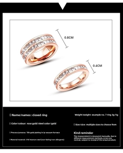 Detail of rose gold titanium steel rings with single and double row zircon settings