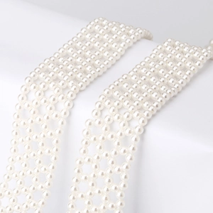 Elegant white pearl beaded waist belt for women shown in a detailed flat lay composition