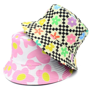 Double-sided reversible bucket hat with colorful floral and checkerboard patterns
