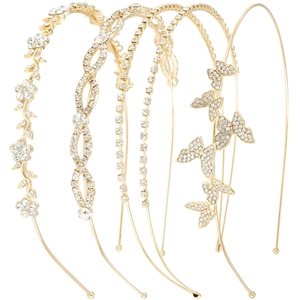 Set of four gold crystal headbands featuring floral and butterfly designs on a white background