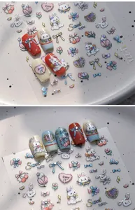 Detailed view of 3D embossed nail stickers featuring rabbit, tulip, and bow motifs