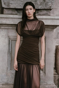 Detail of dark brown mesh maxi dress with ruching textures and mock neck design