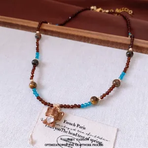 Collier éléphant rétro avec perles de grenat et d'oeil de tigre style Maillard