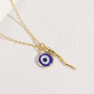 14K gold plated necklace featuring glass evil eye and crescent horn pendants
