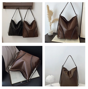 Close-up of vintage large capacity leather hobo shoulder bags in black and brown colors