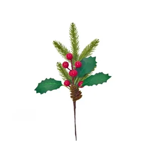 Detail of Christmas artificial pine branch with red berries and small pinecone