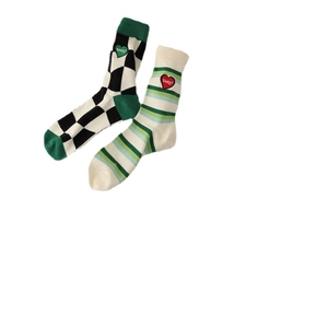 Checkerboard and striped cotton socks with sweet heart embroidery on white background