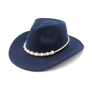 Detailed view of navy blue wool fedora hat featuring elegant floral pearl band decoration