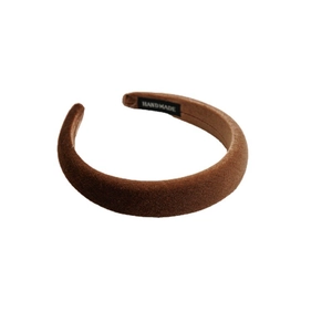 Thick velvet sponge headband in coffee brown featuring a handmade woven interior label