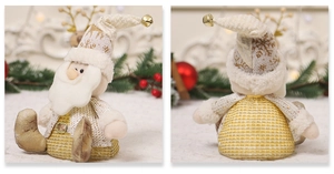 Detail of Santa plush doll with gold and beige knit fabric and metal bell ornaments
