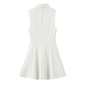 Detail view of the back tailoring and seam structure of a white sleeveless crepe dress