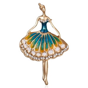 Detailed view of an elegant ballerina brooch featuring gold plating and crystal accents