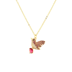 Golden hummingbird pendant necklace with red and white zircon stones in centered view