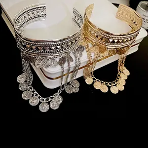 Bohemian gold and silver wide cuff bracelet with pyramid studs and coin tassels
