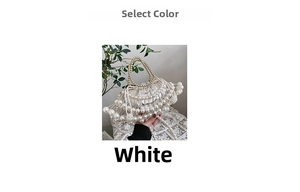 Detail of white pearl beaded handbag with fan-shaped design and circular top handle