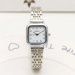 Square silver stainless steel watch for women featuring a white dial and Arabic numerals