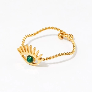 Golden stainless steel evil eye ring with green stone bead and braided twist band