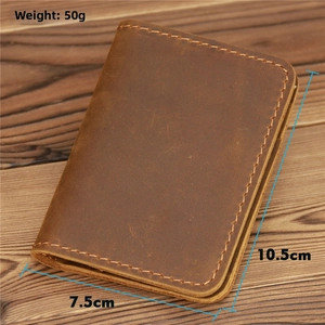 Detailed macro view of retro brown crazy horse leather card holder with 10.5cm x 7.5cm size