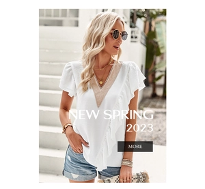 Close-up of white short sleeve blouse with V-neck lace hollow and ruffle detail