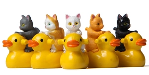Set of five colorful cat figurines riding yellow ducks for micro landscape decoration
