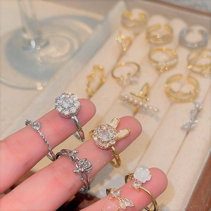 Elegant sparkling zircon heart rings set in gold and silver finish with floral designs