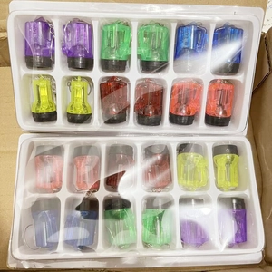 Wholesale mini LED flashlight keychains in assorted colors packaged in bulk trays