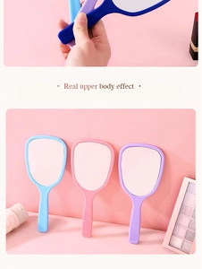 Three handheld makeup mirrors in blue, pink, and purple with elegant plastic frames