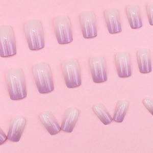 Pink to purple gradient press-on nails with a glossy finish in square-oval shape