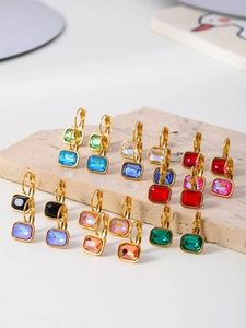 Detailed collection of gold stud earrings featuring vibrant colorful square cubic zirconia