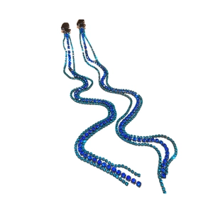 Elegant long silver needle snake earrings with blue rhinestones and flowing tassels