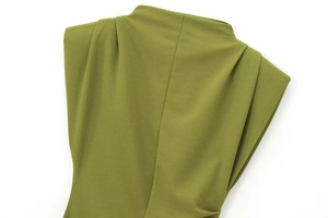 Detail view of olive green dress shoulder featuring pleated design and high-quality fabric