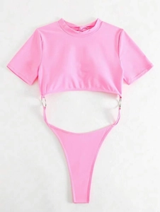 Detailed view of pink cutout one-piece swimsuit with short sleeves and metal ring accents