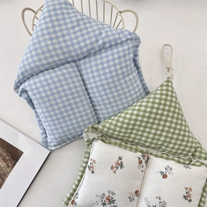 Detail of macaron plaid hanging storage bags with floral lace trim and convenient lanyards