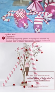 Close-up of pink and white spiral candy cane ornaments with red glitter accents