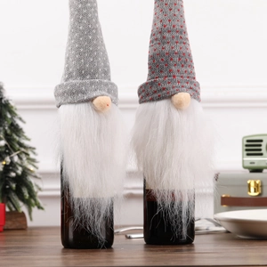 Detail of Christmas gnome wine bottle covers with knitted hats and white faux fur beards