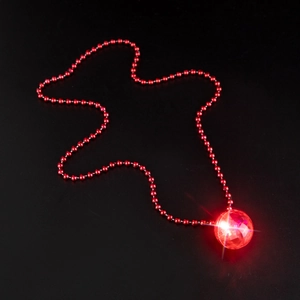 Detailed view of a glowing red disco ball pendant on a matching beaded chain necklace