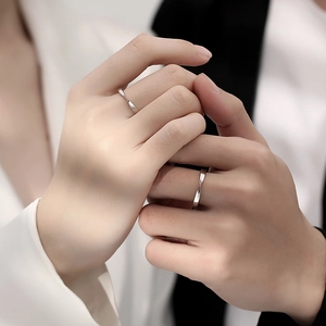 Minimalist Mobius silver couple rings featuring a classic twisted design for lovers