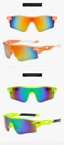 Detail view of orange and neon green cycling sunglasses with mirrored lenses and air vents