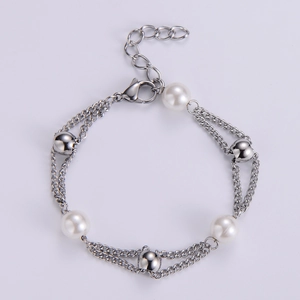 Double-layered silver titanium steel bracelet with natural freshwater pearls and tag