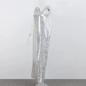 Detail view of silver sequin evening dress showing the slim fit and side profile