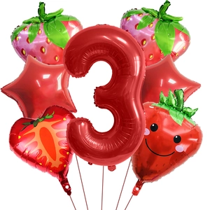 Detail of red number 3 strawberry balloon set with smiling fruit and stars for parties