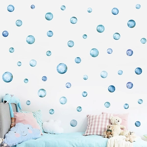 Blue watercolor bubble wall decals for kids room with artistic translucent circular shapes