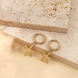 Bohemian gold starfish hoop earrings in 18k plated steel on natural stone base