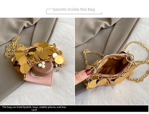 Detail view of mini sequin chain bag showing interior storage for lipstick and cards