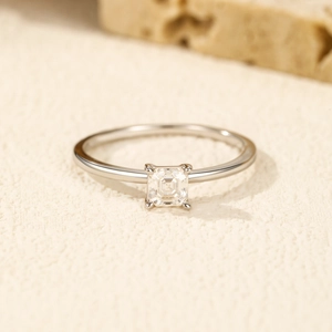 Minimalist S925 silver ring with a square-cut moissanite stone in a four-prong setting