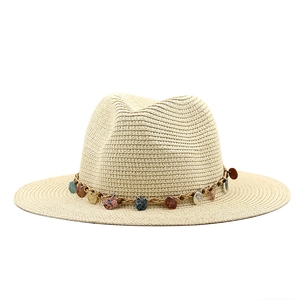Straw Panama hat for men and women featuring a colorful beaded decorative band
