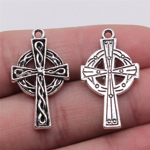 Pair of antique silver Celtic cross pendants with intricate embossed weave textures