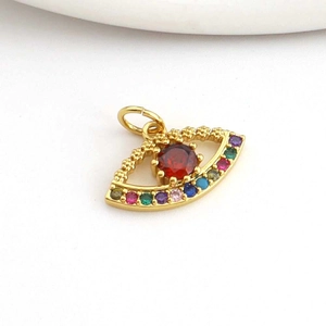Macro shot of evil eye pendant with gold finish and vibrant multi-color zircon stones